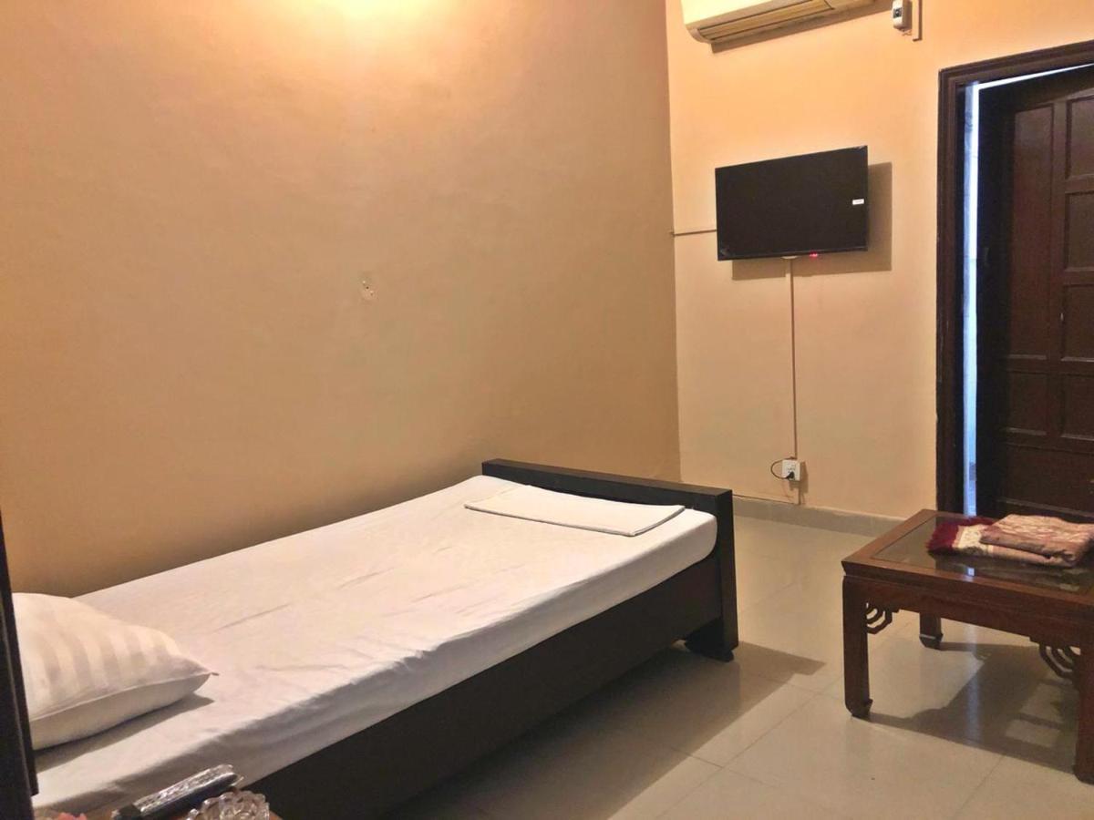 Hotel Babar House Faisalabad Esterno foto